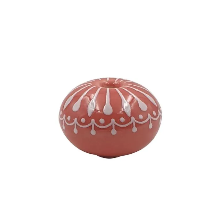Poignée de cocotte rose