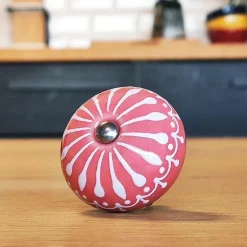 Poignée de cocotte rose